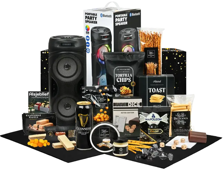 Goed gevuld kerstpakket met draagbare speaker, 5 dobbelstenen en diverse zoete en hartige foodproducten