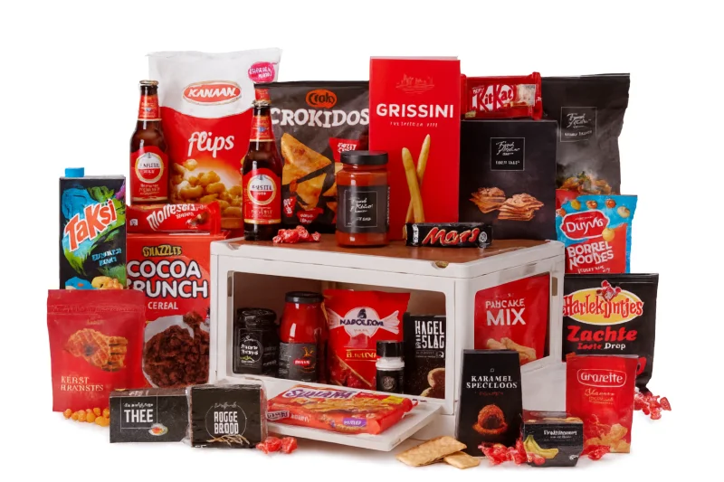 Stralend kerstpakket met diverse lekkernijen en dranken