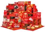 Luxe kerstpakket Fantastisch met terra cotta schaaltjes, zoete en hartige snacks, en Coca Cola