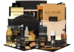 Luxe kerstpakket met Janzen giftset, warmte kussen, teddy plaid zwart, mok en diverse dranken